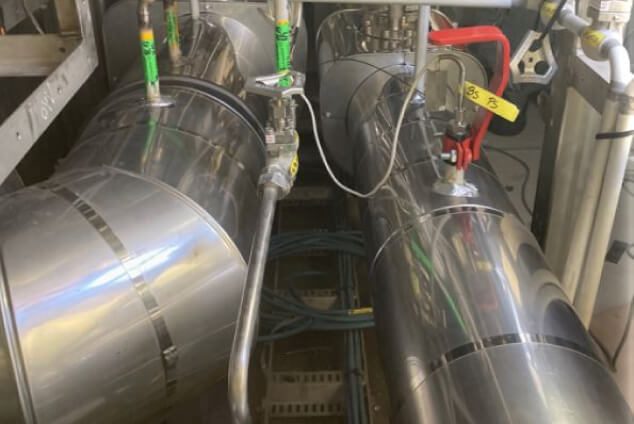 Two shiny parallel pipes